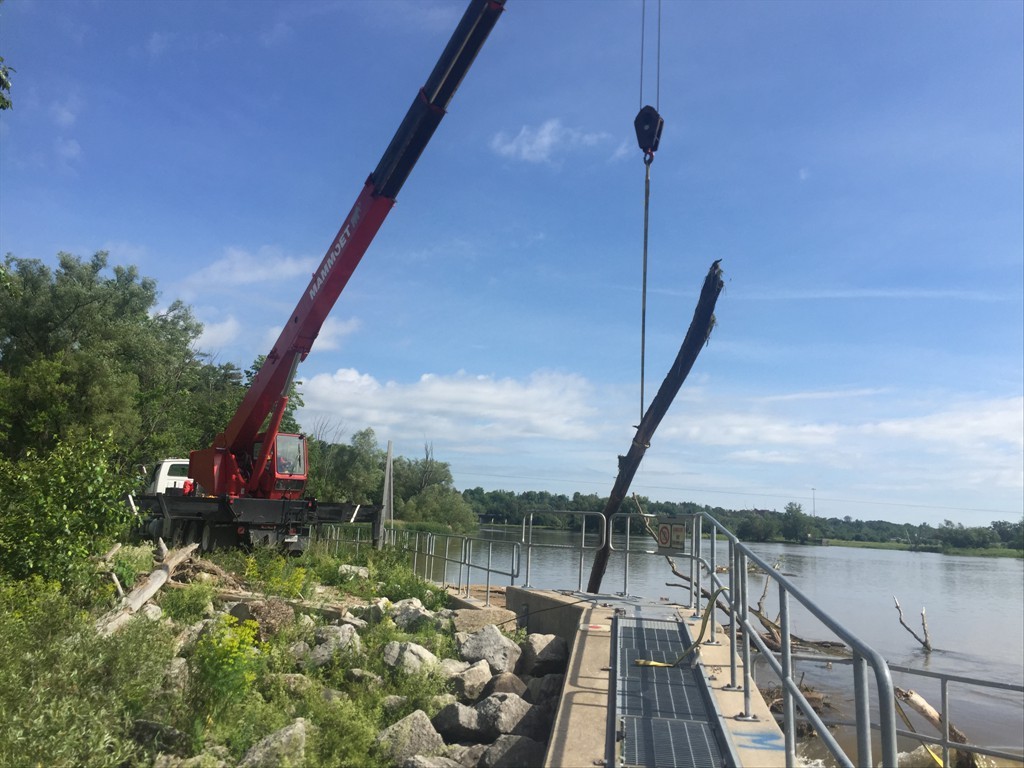 Debris removal at the Mannheim Weir, Grand River, Kitchener, Ontario