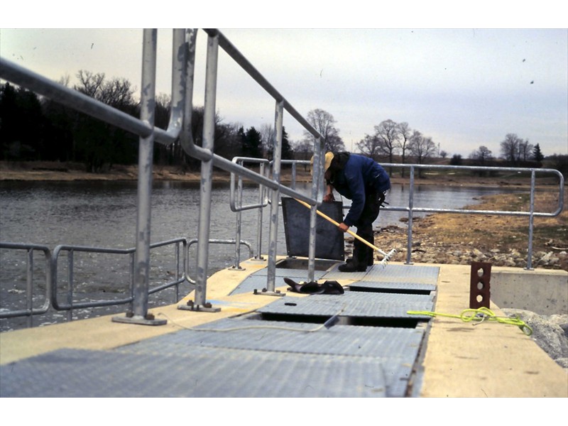 Cleaning the fishway at the Mannheim Weir, Kitchener, Ontario