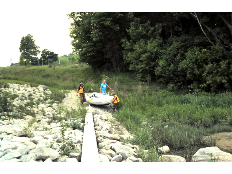 Preparing to track smallmouth bass by Zodiac near the Grand River, Kitchener, Ontario