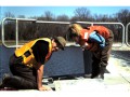 Cleaning the fishway at the Mannheim Weir, Kitchener, Ontario