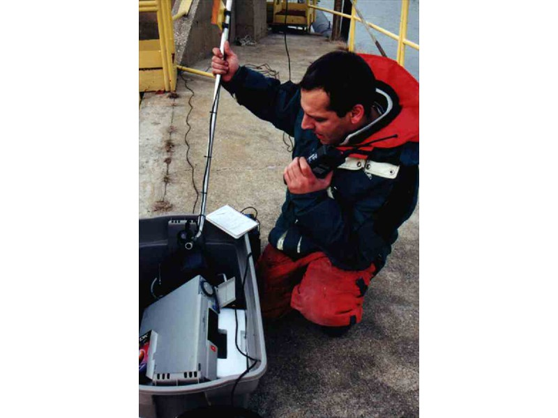 Running videography equipment at the DOW Chemical Dam, Tittabawassee River, Midland, Michigan