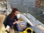 University of Guelph Master's student performing study of fish passage in denil fishway, Grand River, Ontario